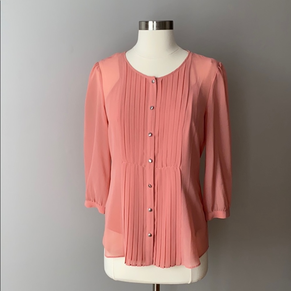 Pink blouse with buttons